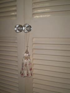 After pic of pantry with new crystal door knobs & tassel